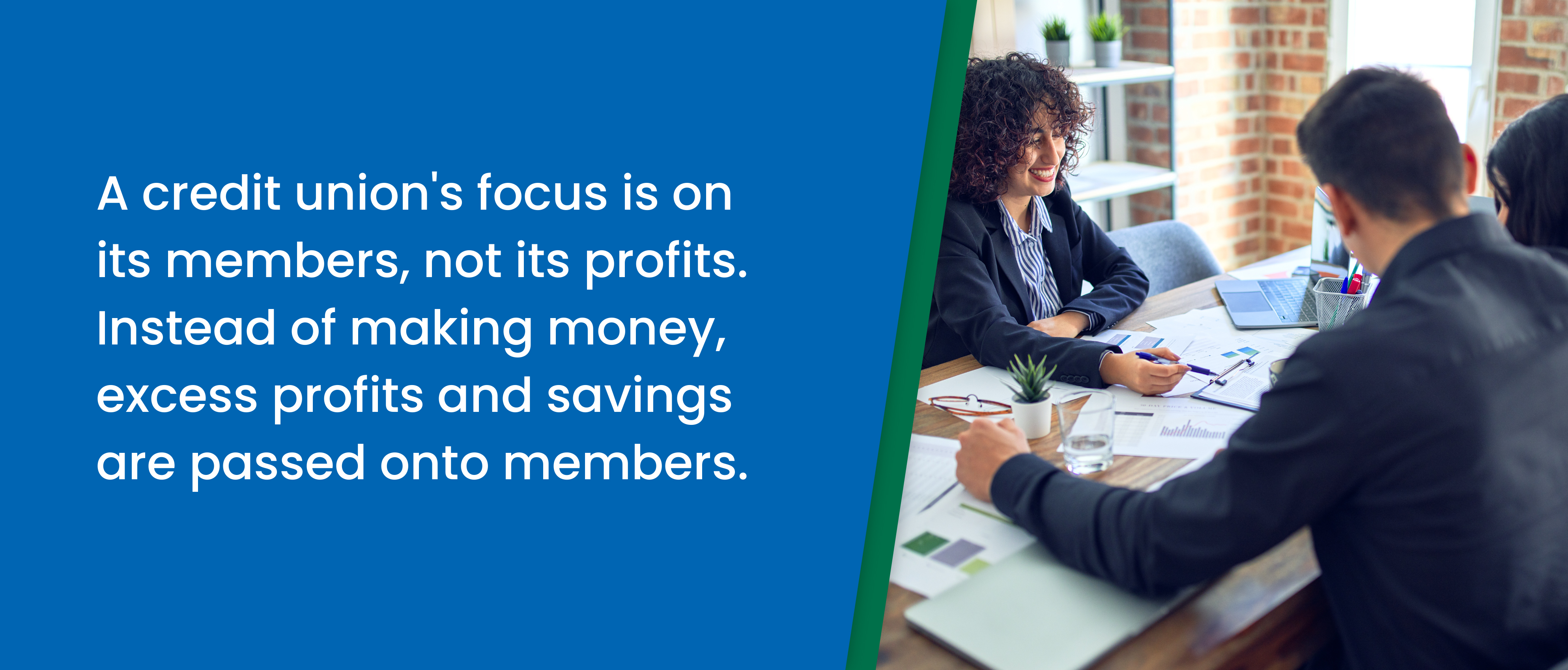 A credit union's focus is its members, not its profits. Instead of making money, excess profits and savings are passed to its members - credit union representative looking at paperwork with a member